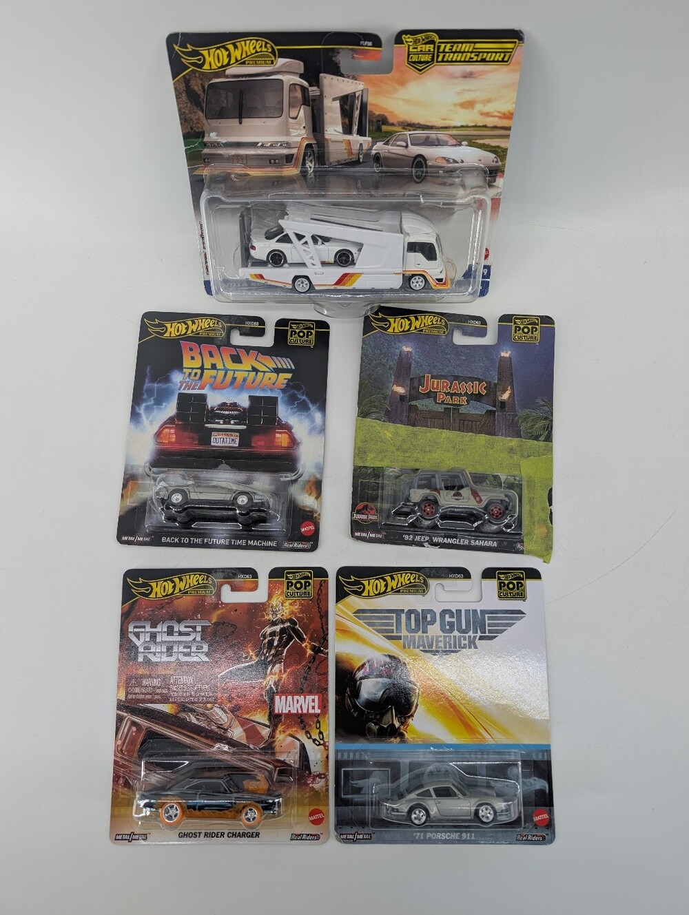 Hot Wheels Collectible Cars 4 Cars And One Transporter & Cars Assorted Damaged